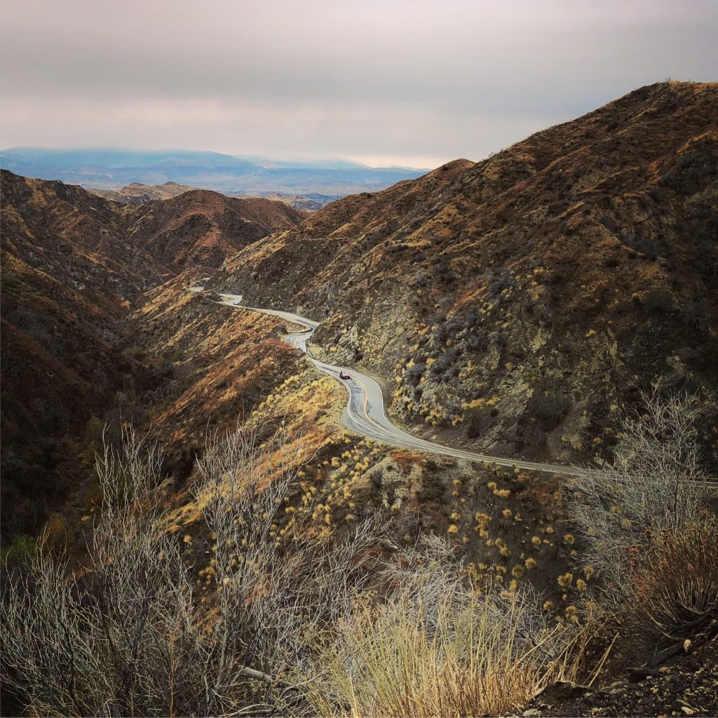 Desert roadway through the mountains