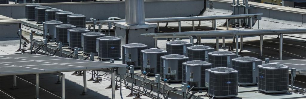 Many rooftop AC units on one site